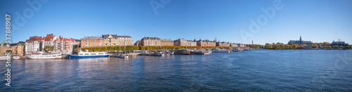 Hotel and office houses at the street Strandvägen in the bay Nybroviken a sunny a color full autumn day in Stockholm