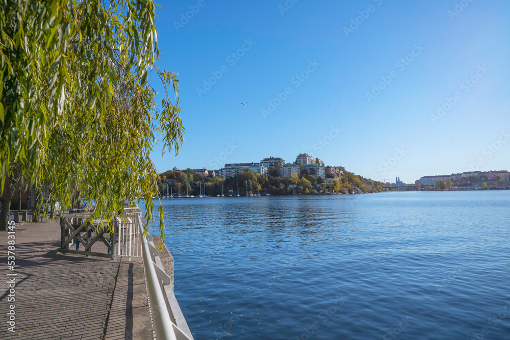 Pier view from the district Alviks Strand a sunny a color full autumn day in Stockholm