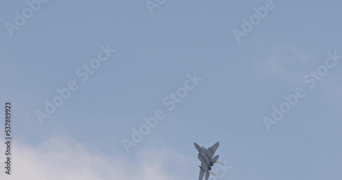 F-15 fighter jet maneuvering during an airshow