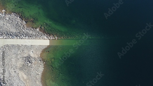 Top shot of a river and the shore in Rauland mountain village, Norway photo