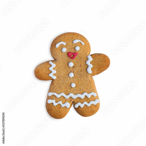 The gingerbread man, decorated with colored glaze, is isolated on a white background. Christmas ginger cookies. Top view.