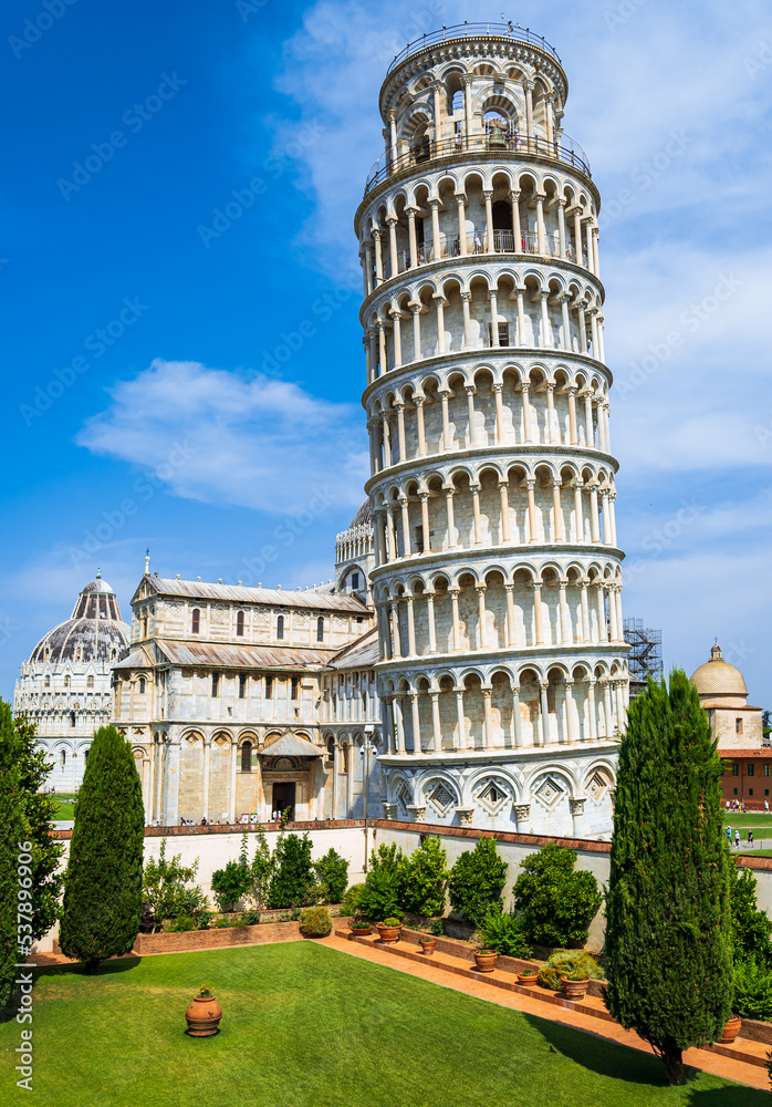 The leaning tower of Pisa and other historical buildings at miracles square