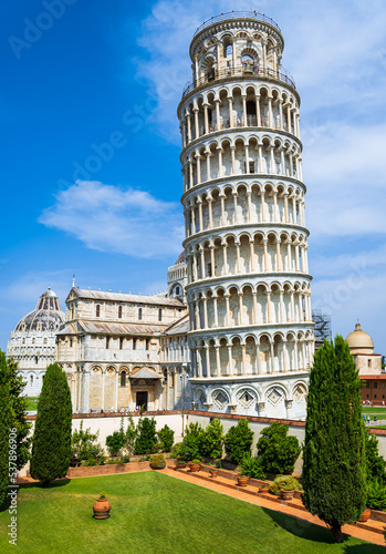 The leaning tower of Pisa and other historical buildings at miracles square