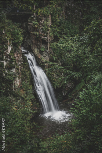Mountain waterfall during fall