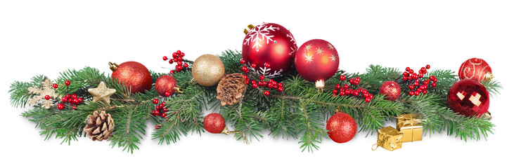 Christmas decorations with  tree branches and  baubles  isolated on white background
