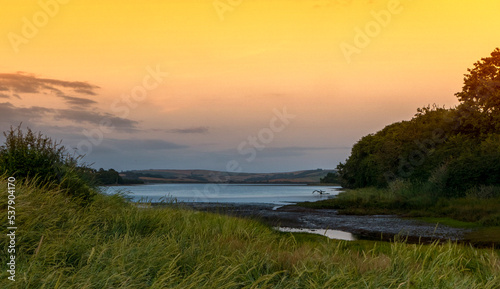 Sunset over estuary