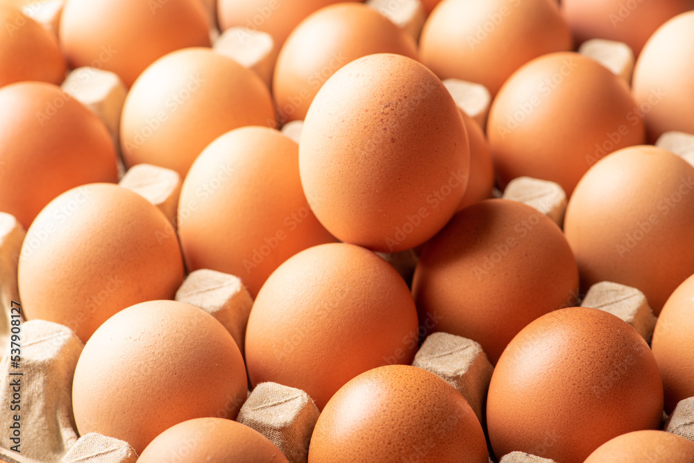 Eggs, detail of red eggs in a row, selective focus. Eggs, detail of red eggs in a row, selective focus.