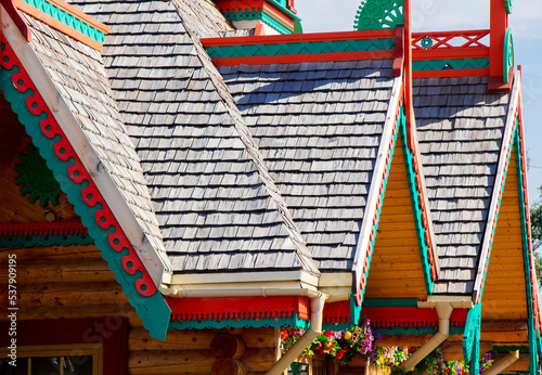 Wooden roofs of a wooden house. Roofs are like in a fairy tale.