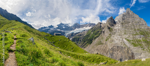 The massif of Grosses Fiescher horn peak and Berghaus Baregg chalet - Switzerland - Grindelwald.