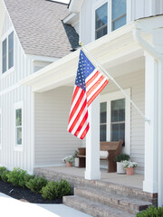 American flag on a modern farmhouse