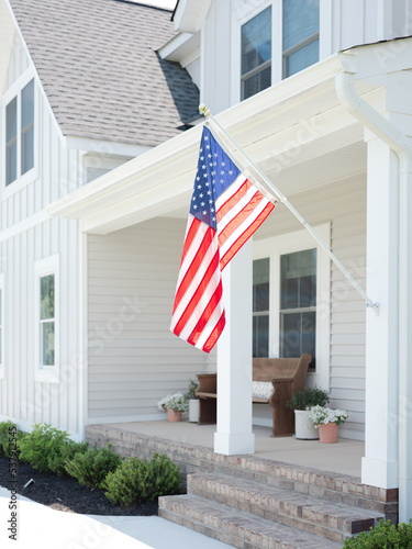 American flag on a modern farmhouse