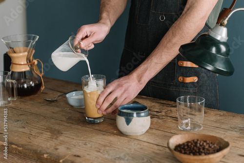 Barman Preparing Latte Macchiato