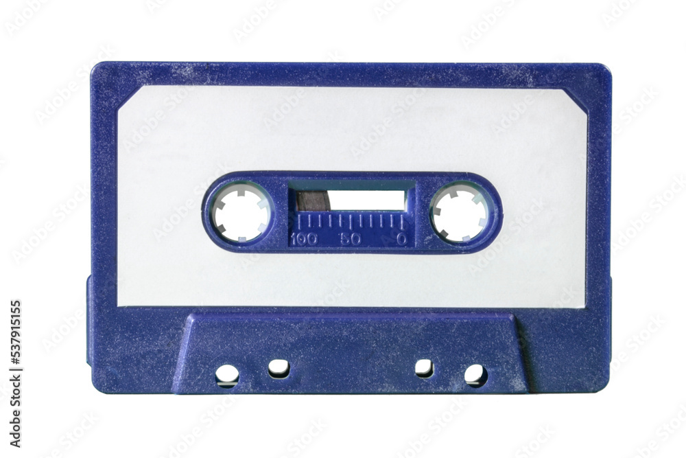 An old vintage cassette tape from the 1980s (obsolete music technology). Deep blue plastic body, white paper label. Isolated.
