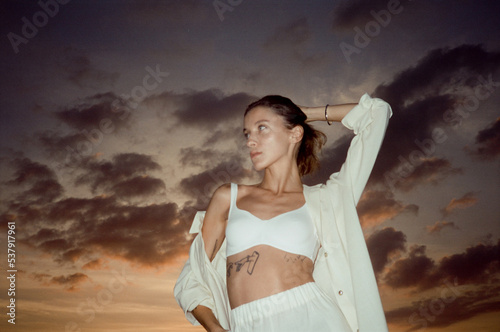 Girl hanging out during sunset  photo