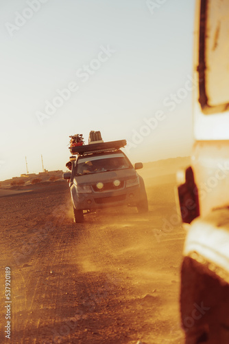 Cars racing in the desert photo