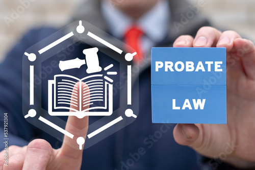 Law concept. Probate law book. Probate law refers to the process that manages any assets and debts left behind by a deceased person.