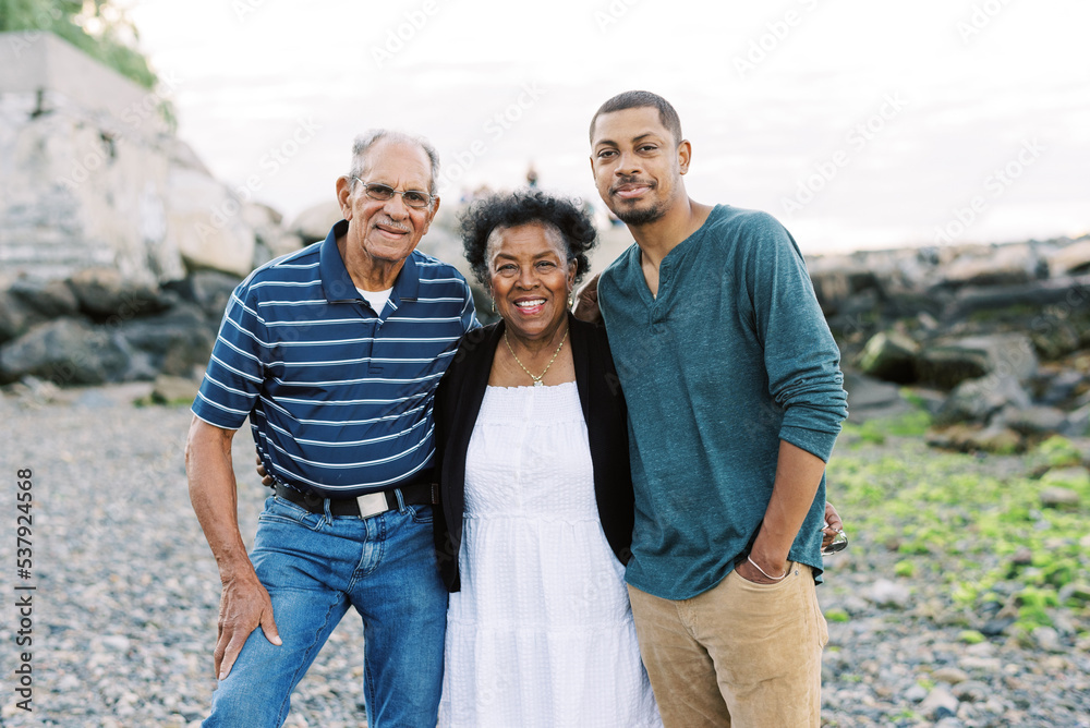 A mother with her husband and adult son