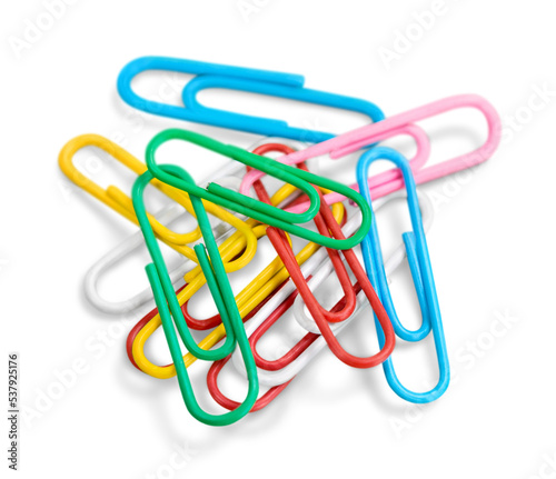 Colored paper clips isolated on white background photo