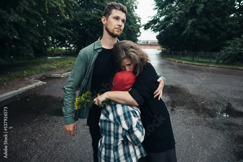 Parents comfort their child