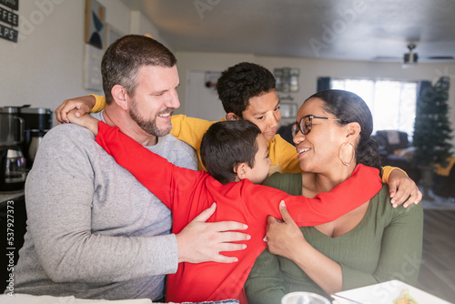 Family hug at Christmas time photo