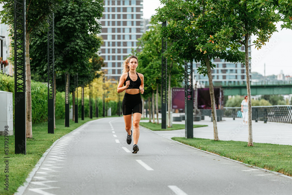 Running On Track In City Quarter. Running On Track In City Quarter.