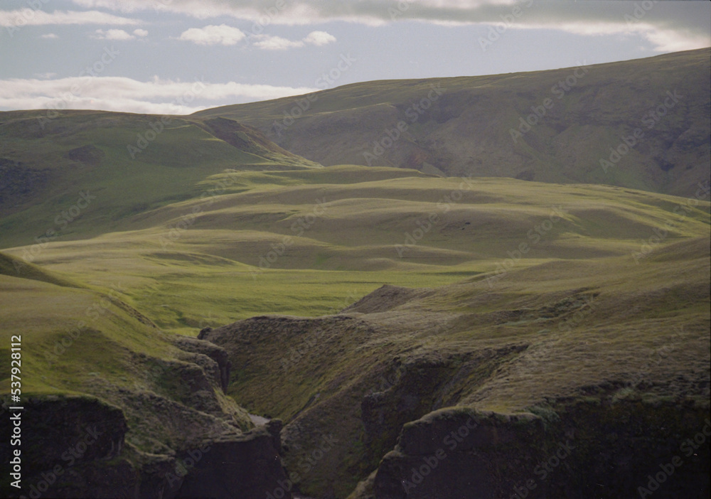 Green hills in Fjaðrárgljúfur canyon in Iceland