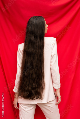 Minimalistic backside portrait of brunette female
