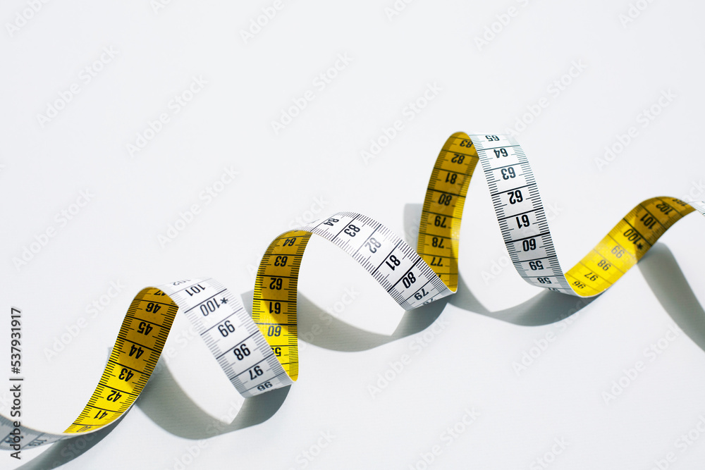 © Malin G/Stocksy - Measuring tape