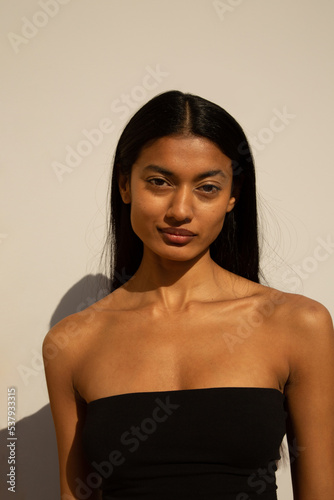 Woman with black strapless top