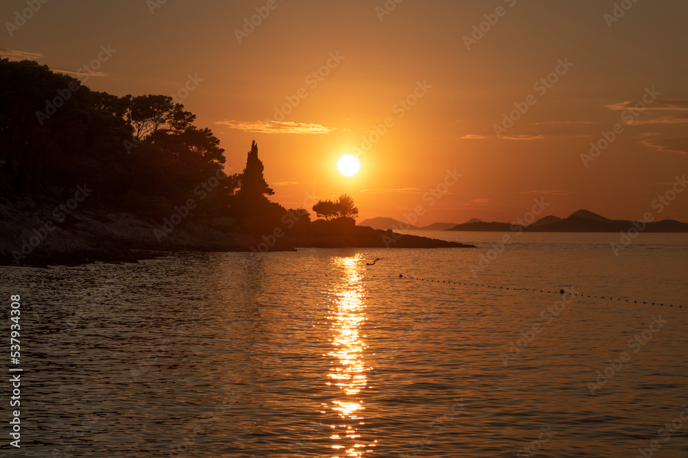 sunset and the sea in golden light sunset and the sea in golden light