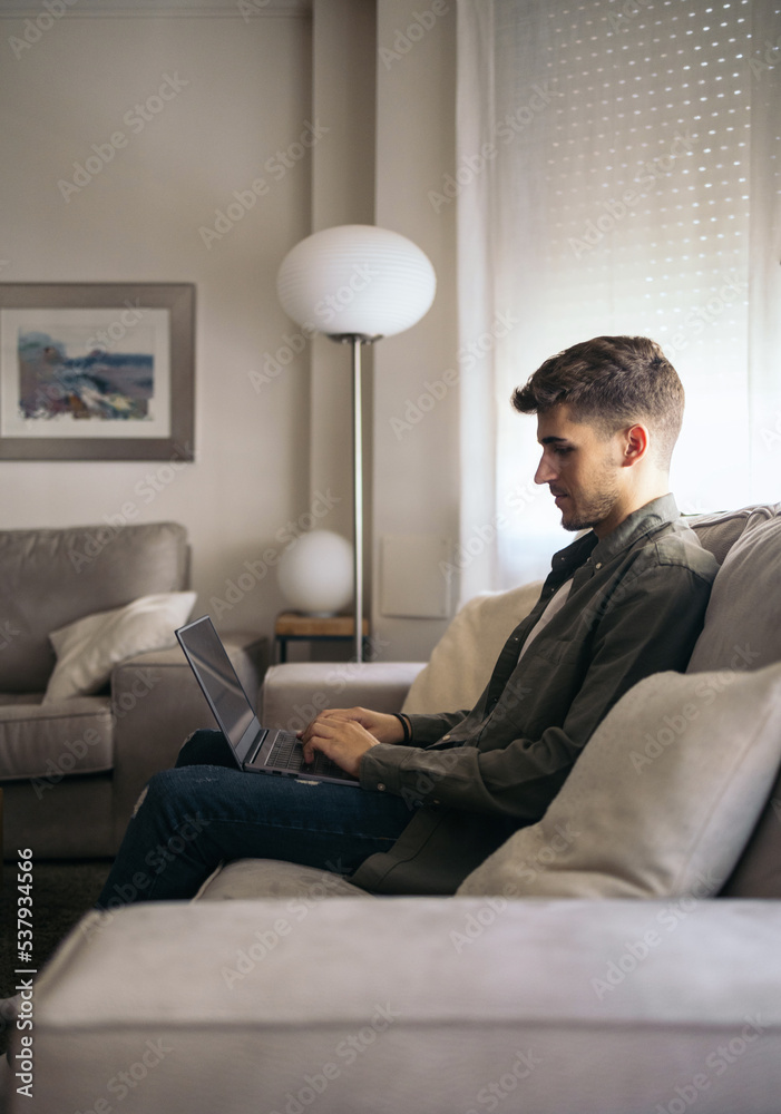 Young businessman working from home
