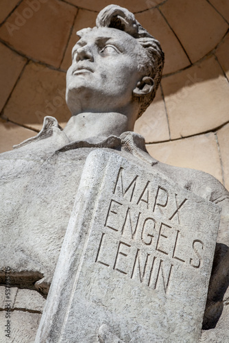 Obraz na płótnie Worker with Marx, Engels and Lenin book in Warsaw, Poland w salonie