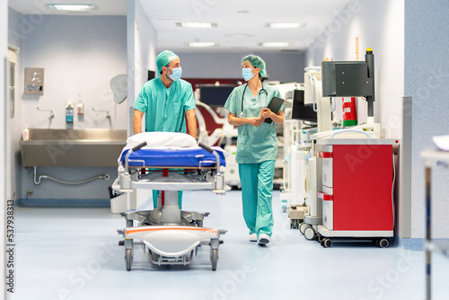 Medical team walking in the hospital photo