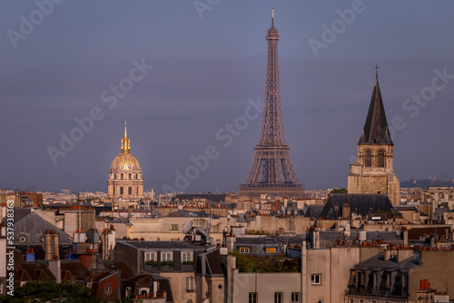 Eiffel tower and Les Invalides at golden sunrise  Paris cityscape  France