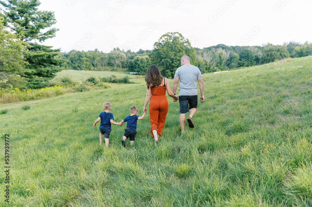 Happy family outdoors together in summer Happy family outdoors together in summer