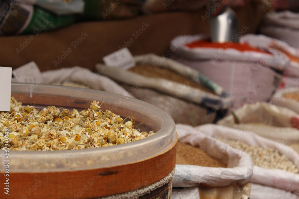 Dried winter tea ingredients in sacks at the store Dried winter tea ingredients in sacks at the store