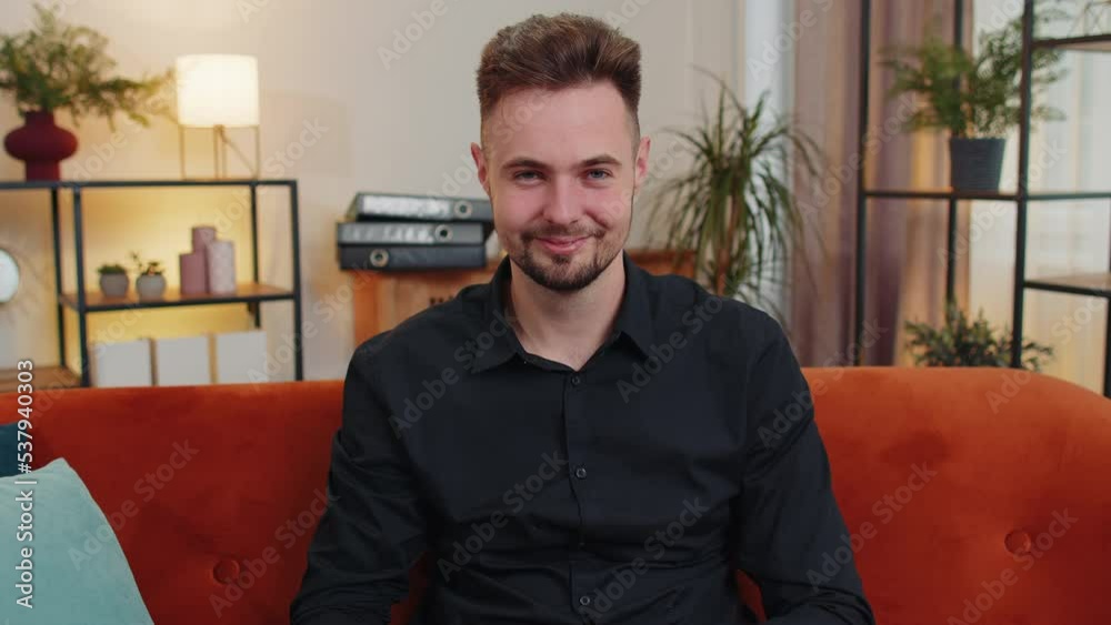 Guy stock trader earning BTC bitcoins after online monitoring trading operations. Man freelancer holding gold coins at home, successful developer programmer. Increasing wealth, financial prosperity Guy stock trader earning BTC bitcoins after online monitoring trading operations. Man freelancer holding gold coins at home, successful developer programmer. Increasing wealth, financial prosperity