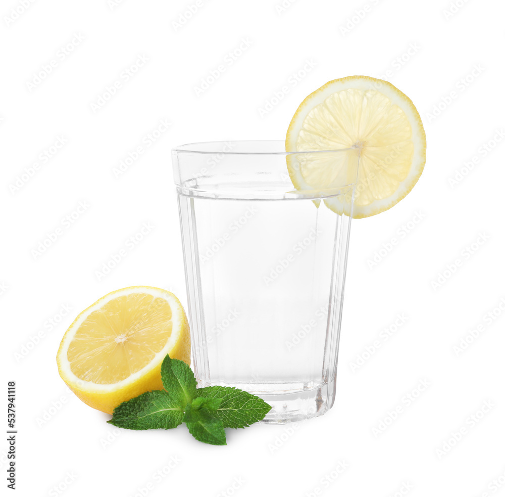 Glass with water, sliced lemon and mint on white background Glass with water, sliced lemon and mint on white background