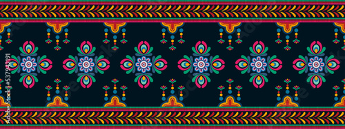 Ikat ethnic seamless pattern decoration design. Aztec fabric carpet boho mandalas textile decor wallpaper. Tribal native motif ornaments traditional embroidery vector background 