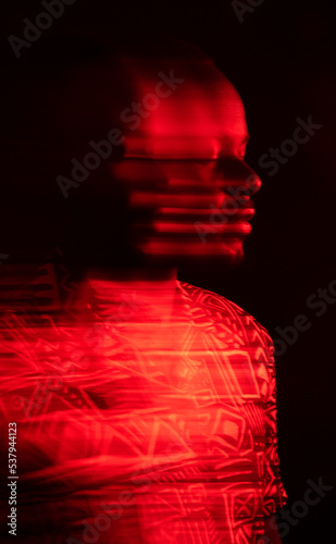 Portrait of young man with double/long exposure effect.  photo