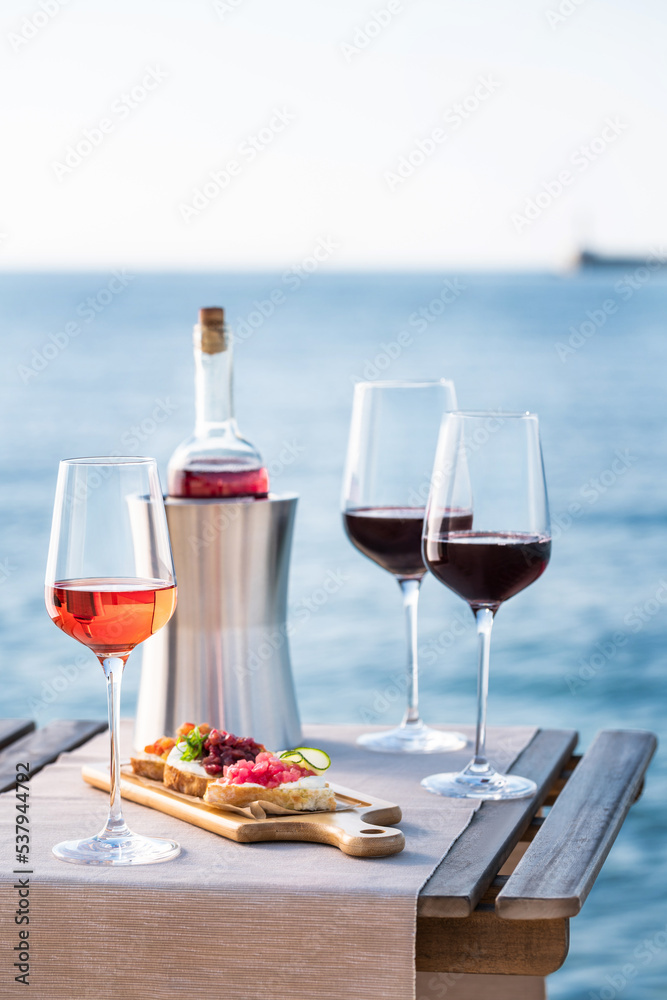 Red and Rose wine served in front of the sea Stock Photo Adobe Stock