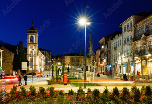 Av. Carvalho Araujo in evening with view of Cathedral of Vila Real, Portugal. Сentral square of city. photo