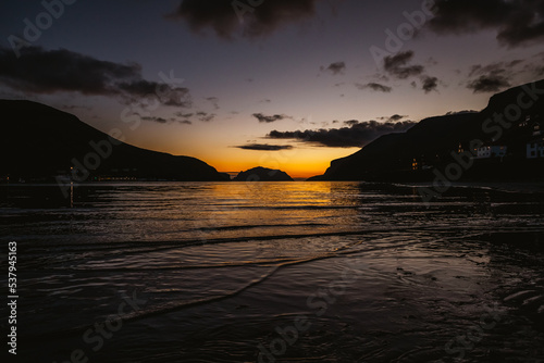 Sunset on a beach in the Faroe Islands photo