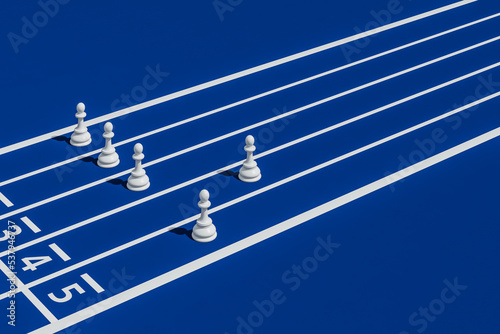 Chess pawns on running track