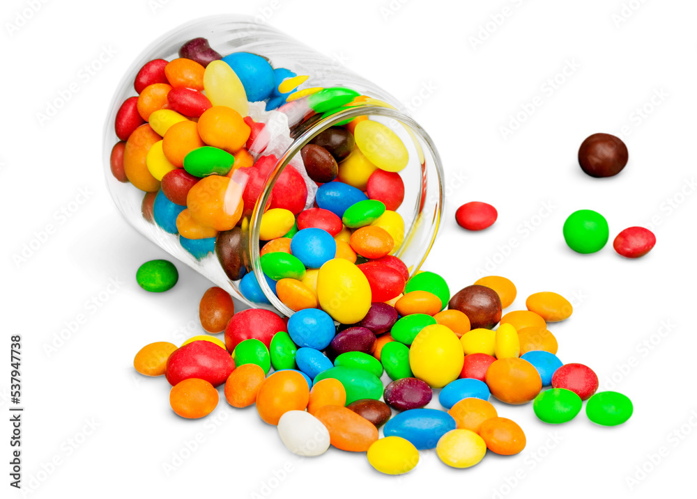 Obraz premium Glass jar with colorful candies on white background
