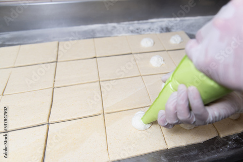 Baker Making Croissant Before Going to the Oven