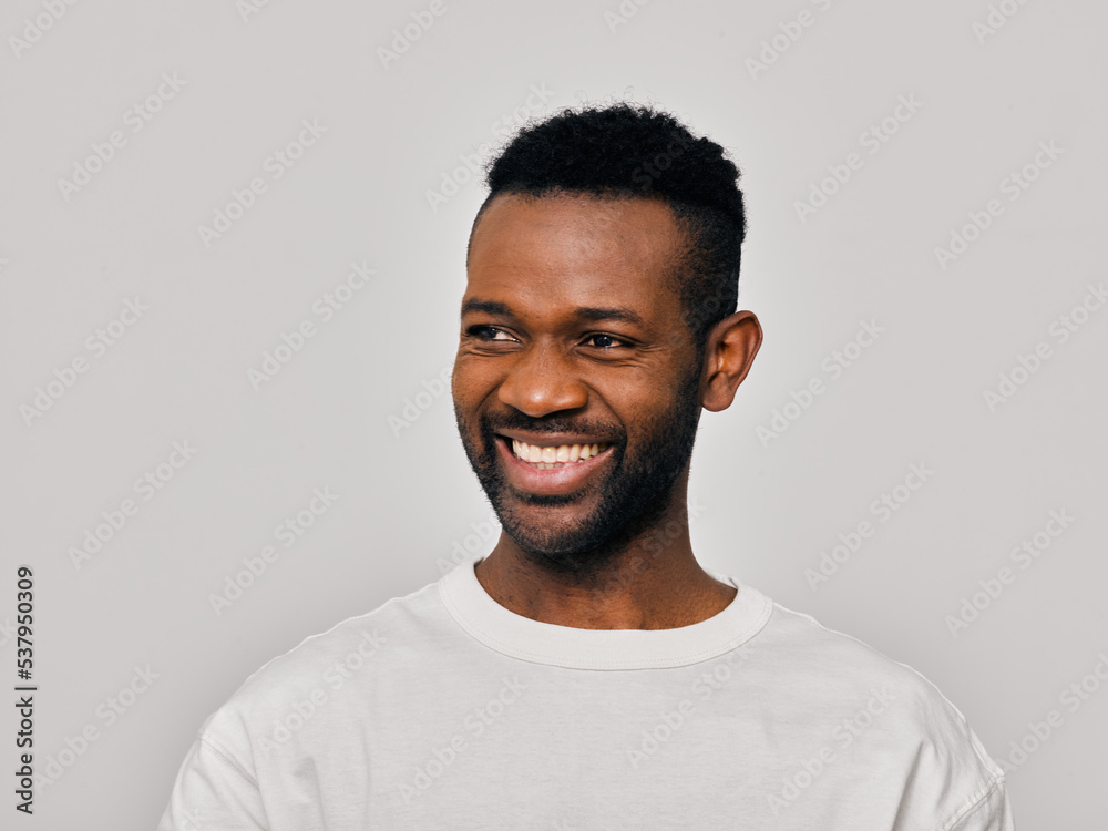 Man in white t-shirt smiling Man in white t-shirt smiling