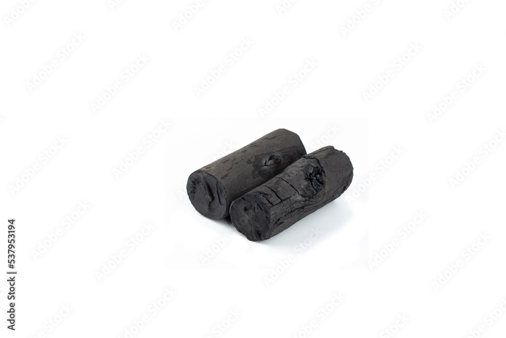Natural wood charcoal isolated on white background. Pile of coal isolated on white background. Natural wood charcoal isolated on white background. Pile of coal isolated on white background.