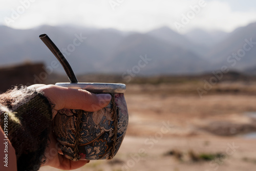 Detail of a hand holding a mate