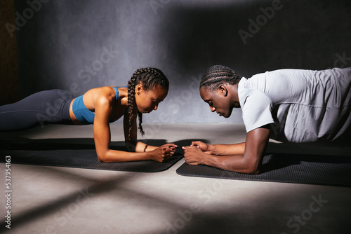 African American athletes doing plank photo